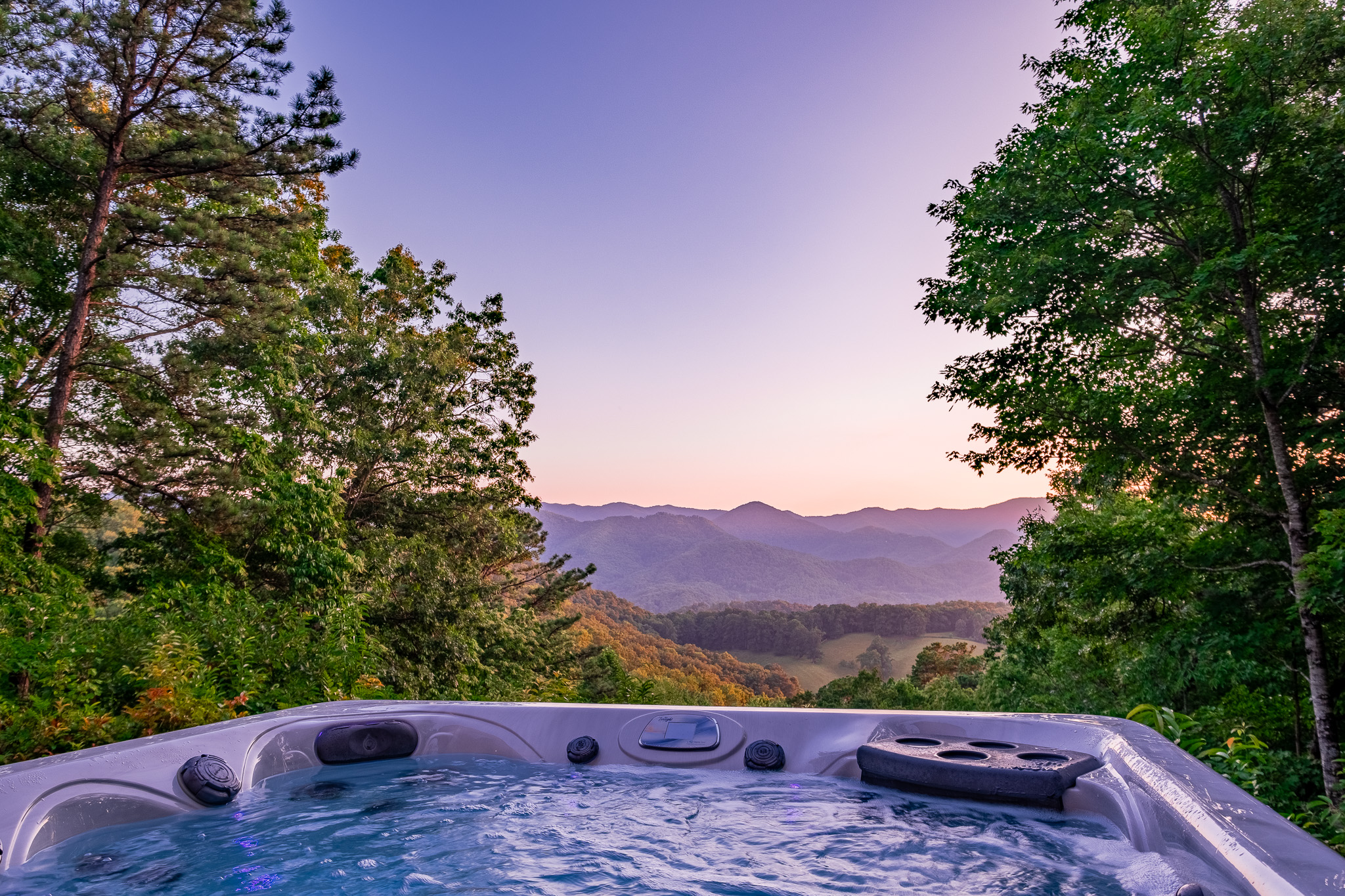 View from hot tub facing Smoky Mountains at sunset